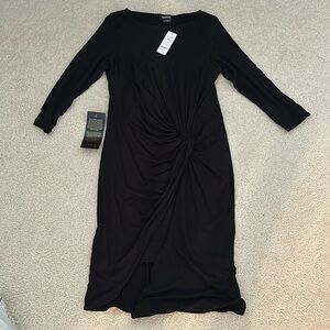 Long sleeve Bebe never worn black dress